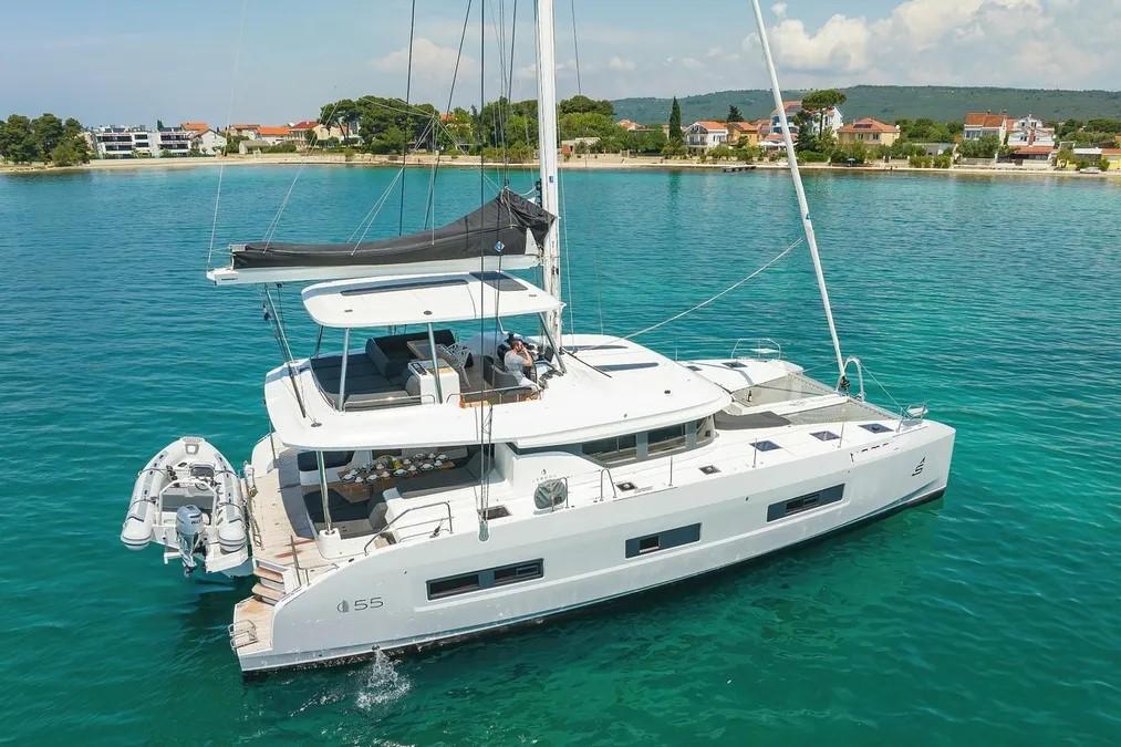 2023 Lagoon 55 catamaran exterior underway