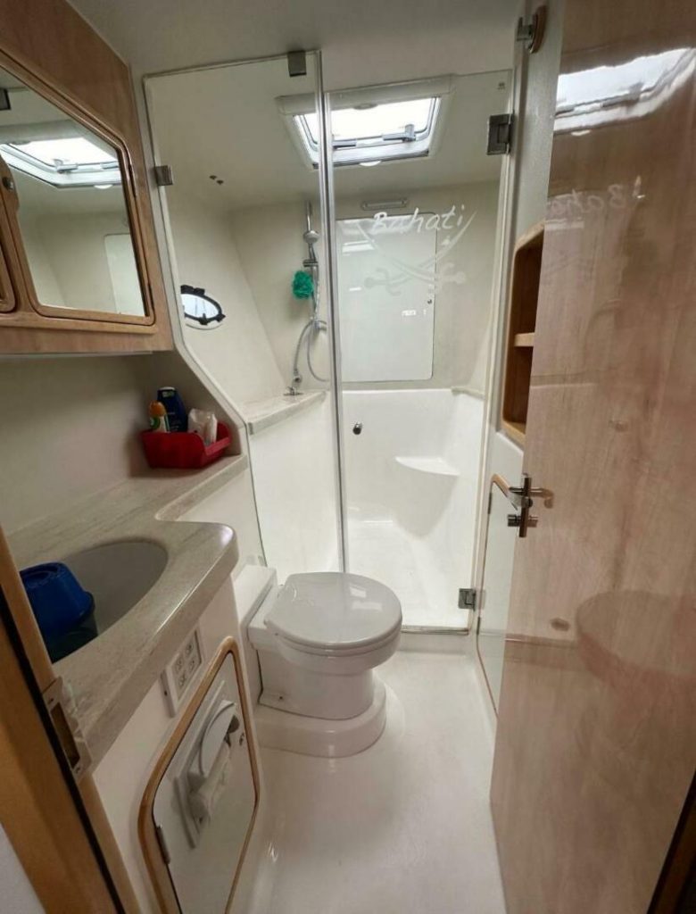 Interior joinery detail aboard the Knysna 500SE, with solid timber trim and lattice locker fronts