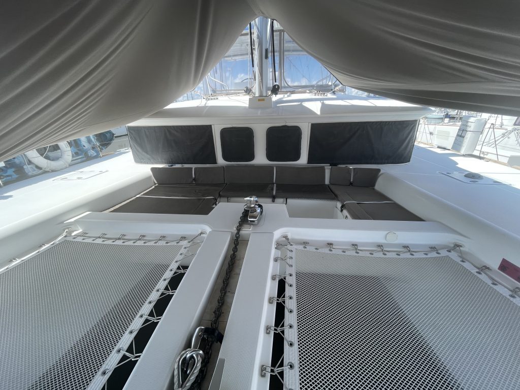 Galley aboard the Lagoon 450F showing refrigerator, three-burner propane stove and deep drawers
