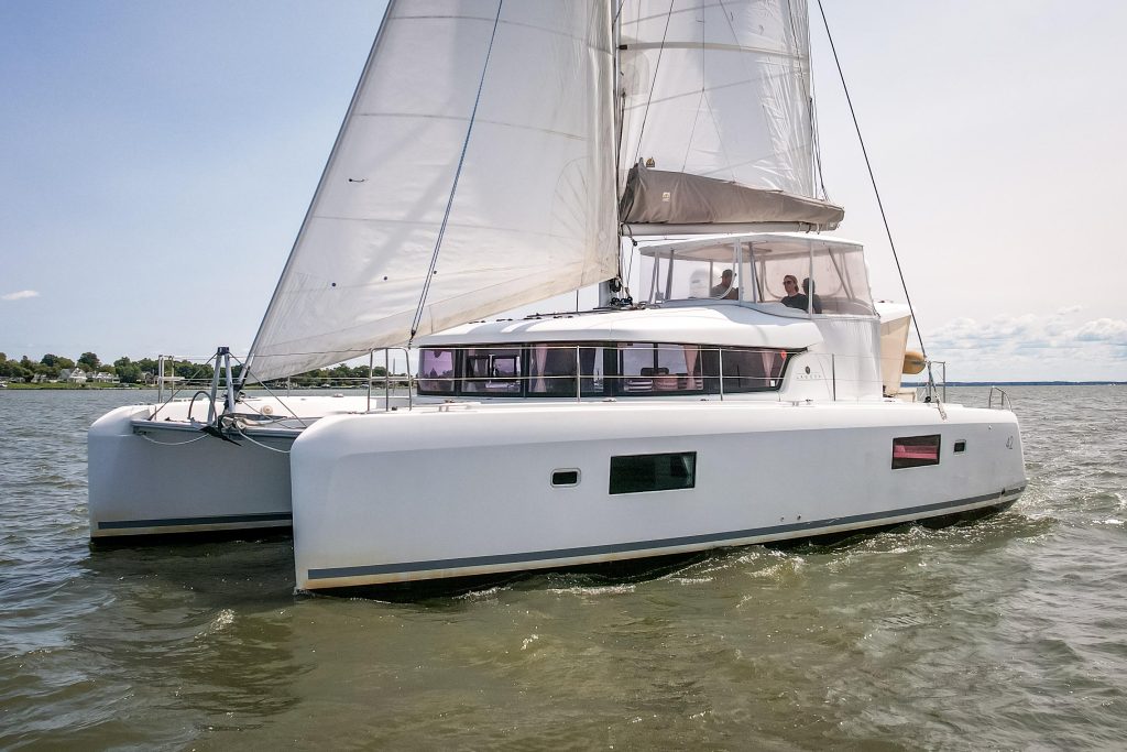 Bright salon and galley interior aboard the Lagoon 42 Owner Version