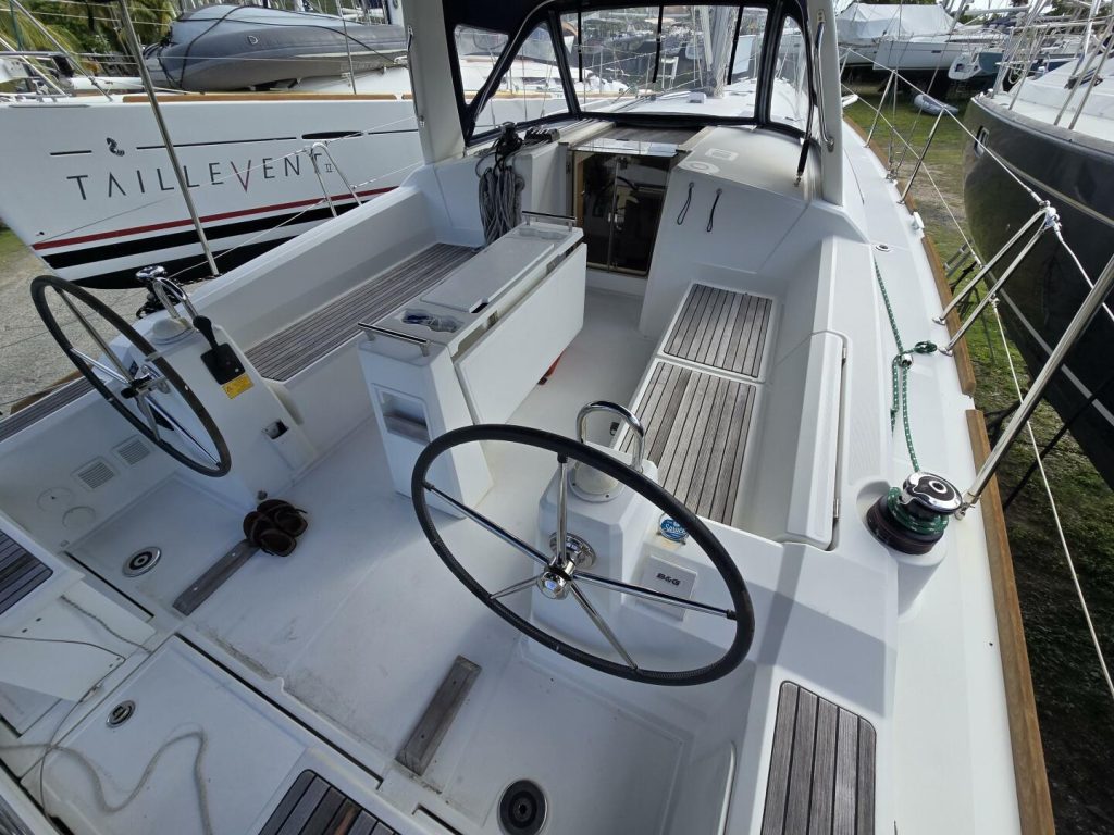 Bright saloon interior of the Beneteau 38.1 with large hull windows