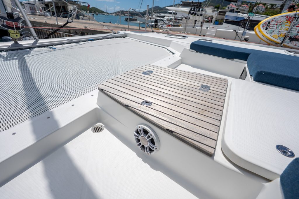 Interior of the Fountaine Pajot Saba 50 Libra showing light veneer cabinetry and salon seating