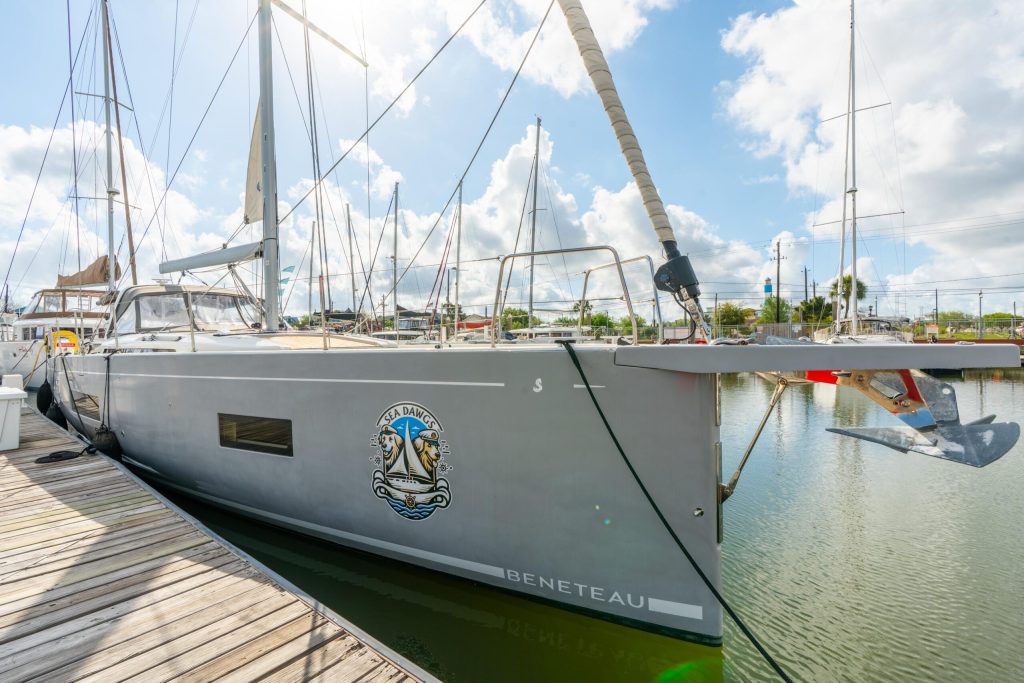 Beneteau Oceanis Yacht 54 sailing profile with full teak decks