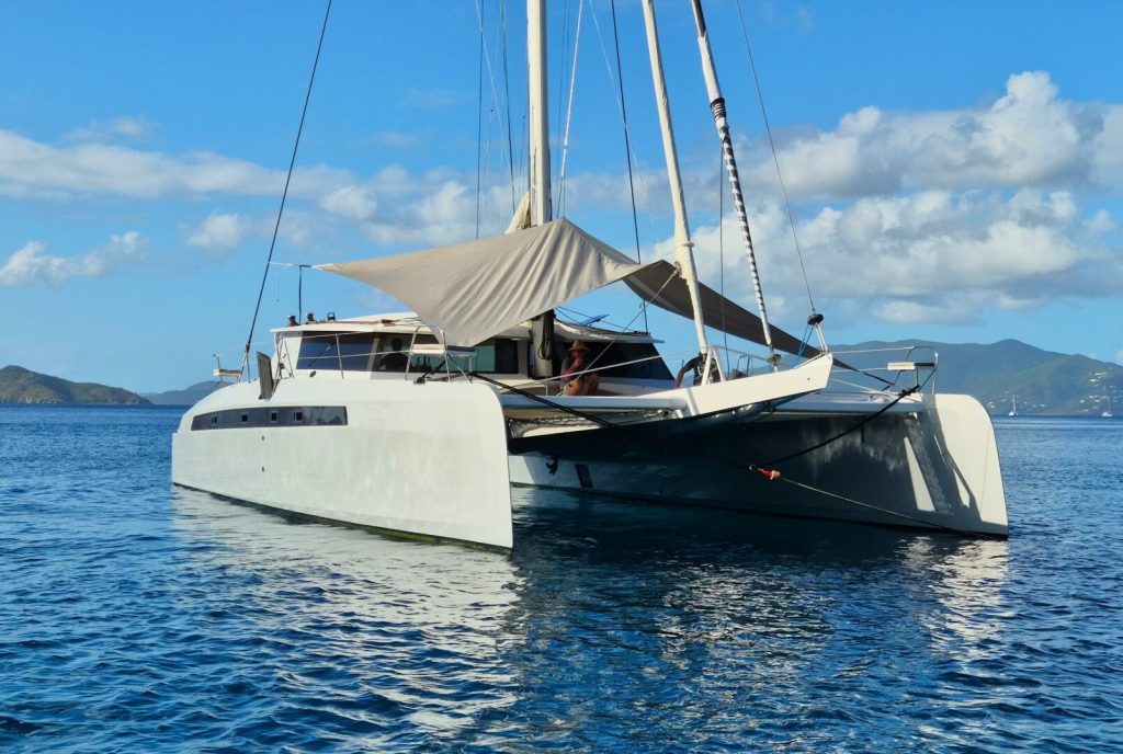 Teak-trimmed interior and galley aboard the 2016 Alibi 54