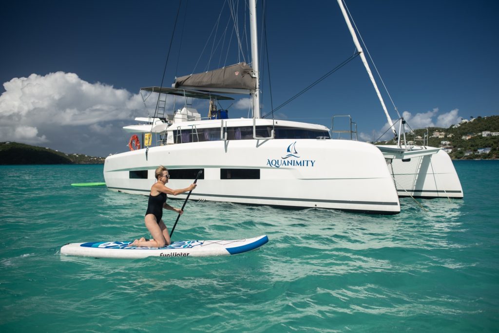Foredeck and rig of the Dufour 48 Aquanimity with solar array and lounging space