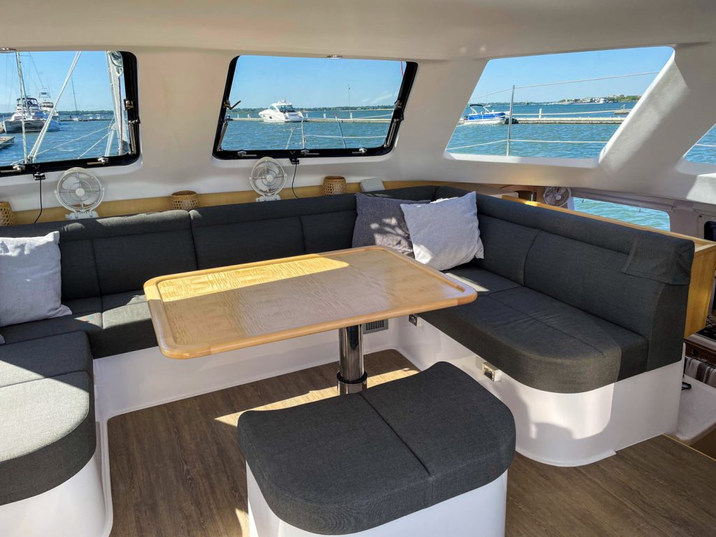 Seawind 1260 salon with tri-fold door open to cockpit
