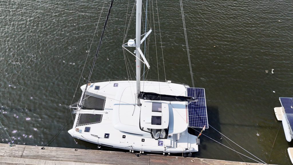 Drone view of the Lagoon 42 catamaran's foredeck, trampolines and bowsprit