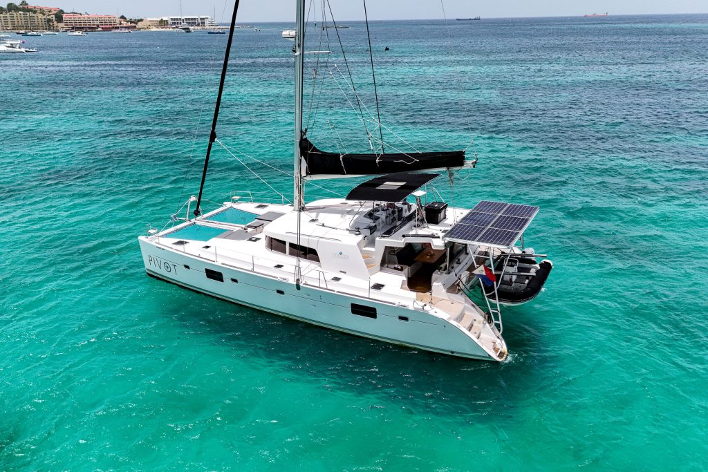 Drone shot of the Lagoon 500 S/V Pivot showing her wide beam, flybridge and cockpit
