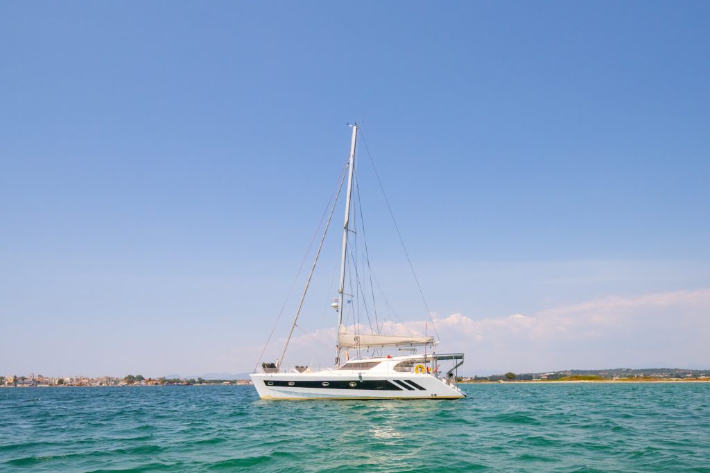 2013 Knysna 480 catamaran S/V Seaducer under way, showing her raked bows and low-profile coach roof